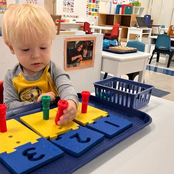 Montessori math materials laid out on a work mat